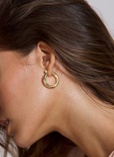 "Fall in love with our thick chunky round hoops, our hoops earrings will be your new favorites! Modern and sleek. DETAILS: All hoops are sold in pairs. Diameter: 25.5mm Width: 5.5mm QUALITY: * 100% 14k Gold Vermeil or Sterling Silver available What is 14k Gold Vermeil? We thought you would ask! :) 14k Gold Vermeil (pronounced \"ver-may\"), should not be confused with gold plating or filled. Vermeil is a much thicker layer of Gold and has a sterling silver interior which gives the pieces their lo Chunky Hoop Huggie Earrings, Chunky Hoop Jewelry, Chunky Small Hoop Jewelry, Minimalist Chunky Hoop Earrings, Chunky Hoop Earrings As A Gift, Silver Hoop Earrings Medium, Dainty Gold Earrings, Chunky Gold Hoop Earrings, Triple Hoop Earrings