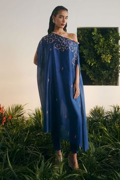 Cobalt blue off shoulder thread embroidered kaftan style tunic. Paired with a blue cigarette pant and a short cotton one shoulder slip. - Aza Fashions One Shoulder Embroidered Festive Sets, One-shoulder Embroidered Festive Sets, Festive One-shoulder Embroidered Set, Festive One-shoulder Set With Resham Embroidery, Traditional One-shoulder Embroidered Dress, Embroidered Kaftan, Kaftan Style, Embroidered Tunic, Fashion App