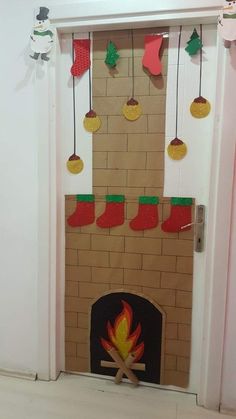 the fireplace is decorated with christmas stockings and stockings