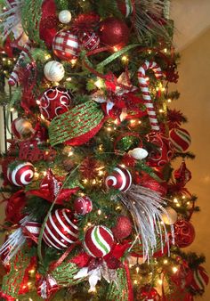 a christmas tree decorated with red and green ornaments