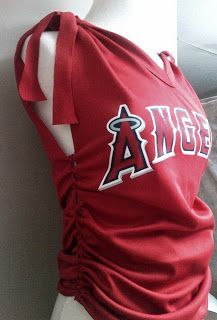 a mannequin wearing a red shirt with the los angeles angels on it