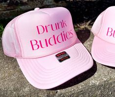 Get ready to have a blast with your buddies in this Drunk Buddies Trucker Hat. With a foam front and mesh back, this fun hat is perfect for any wild adventure. Hang with your friends in style and show off your playful side with this must-have accessory! Cheers to good times (and great hats)! Fun Mesh Trucker Hat Baseball Cap, Pink Flat Bill Trucker Hat For Outdoor, Pink Mesh Hat With Curved Brim, Playful Snapback Trucker Hat For Outdoor, Fun Snapback Trucker Hat For Outdoor, Playful Outdoor Trucker Hat With Curved Brim, Playful Curved Brim Trucker Hat For Outdoor, Fun 5-panel Trucker Hat For Outdoor, Fun Trucker Hat For Outdoor Use