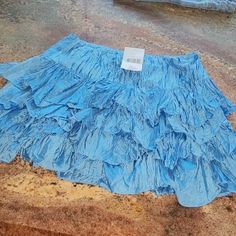 Rugby Ralph Lauren Skirt. Size Xs. Never Worn. Super Cute. Looks Better In Person. Blue Stretch Ruffle Skort, Blue Ruffled Stretch Skort, Fitted Light Blue Bottoms With Ruffles, Stretch Blue Tiered Skirt, Blue Fitted Tiered Mini Skirt, Blue Ruffled Skirt Bottoms For Summer, Chic Light Blue Bottoms With Ruffles, Blue Stretch Tiered Mini Skirt, Trendy Blue Tiered Mini Skirt