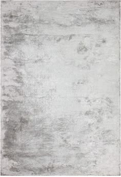 an area rug with grey and white colors