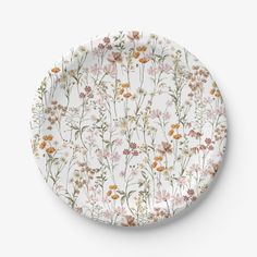 a white plate with flowers on it