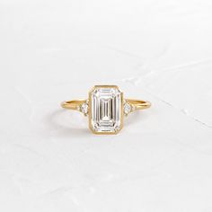 |14k Yellow Gold Emerald Cut Engagement Ring, Bezel Set Engagement Ring, Melanie Casey, Ring Emerald Cut, Emerald Cut Engagement, Emerald Engagement Ring Cut, Twisted Band, Emerald Cut Diamond, Ring Emerald