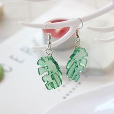 Fresh Acrylic Green Leaf Dangle Earrings For Women New Bohemian Charm Drop Earrings Young Girl Party JewelryModel Number:32880602429 Trendy Dangle Clip-on Earrings, Trendy Single Dangle Clip-on Earring, Casual Green Jewelry For Party, Trendy Dangle Clip-on Earrings With Ear Wire, Trendy Leaf-shaped Earrings For Gifts, Trendy Clip-on Dangle Earrings, Palm Tree Leaf, New Bohemian, Earring Dangle