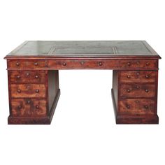 an antique desk with marble top and drawers on one side, against a white background