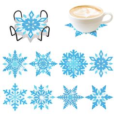 a cup of coffee sitting next to some blue snowflakes