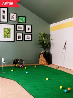 a living room with balls on the floor and pictures on the wall