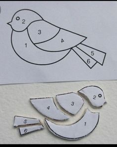 a piece of paper cut out to look like a bird