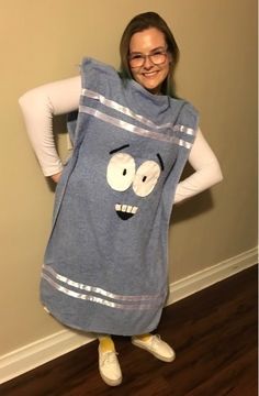 a woman is wearing a towel as she poses for the camera