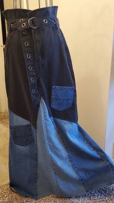 Absolutely stunning very long BOHO style denim patchwork maxi skirt with belt.  Size M (8) Waist  30 inches  Length  45 at its longest in the back Black, dark blue, medium blue and hints of polka dots High Waist and belted Raw edges and hem Hem left long and may be cut to your Length if desired  Upcycled from premium denim  Please feel free to contact me if you have any questions. Blue Long Patchwork Skirt, Maxi Skirt With Belt, Dark Wash Denim Skirt With Patchwork, Fitted Dark Wash Patchwork Denim Skirt, Denim Patchwork Long Skirt, High-waisted Denim Patchwork Skirt, Patchwork Maxi Skirt, Dark Wash Patchwork Denim Skirt, Medium Wash Patchwork High-waist Denim Skirt