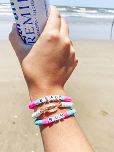 Headed on a beach vacation?! This makes the perfect beach accessory. "Beach Bum" pink and turquoise bracelets with white puka shell stretchy bracelet. Beachy Friendship Bracelets For Summer, Pink Strand Bracelet For Vacation, Pink Beach Bracelets For Beach Season, Vacation Strand Beaded Bracelets For Beach Season, Strand Friendship Bracelets For Beach Vacation, Pink Strand Friendship Bracelets For Beach Season, Pink Strand Bracelets For Beach Season, Beachy Beaded Bracelets For Beach Season Vacation, Pink Strand Bracelets For Beach Style