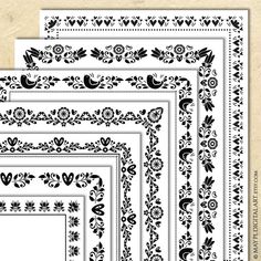 four black and white frames with floral designs