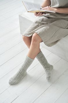 A pair of light grey chunky wool socks! Knitted hypoallergic Sheep-Wool Socks keep you warm on the coldest day! These trendy and adorable, soft socks are the perfect gift idea! Natural wool improves blood circulation, performs the function of micro-massage, and normalizes blood pressure. ❤️ Looking for casual socks? Take a look at our favourite linen socks pair -> -> -> https://www.etsy.com/listing/857250724 You can buy a pair of wool socks for your loved one! - - - - - - - - - - - - - Comfortable Knitted Gray Socks, White Wool Socks, Wool Winter Socks, Merino Wool And Cashmere Socks Gray, Womens Wool Socks, Thick Wool Socks, Soft Sock, Chunky Wool, Wool Socks