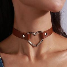 ~Brown Vegan Leather Silver Open Heart Choker Necklace ~11/2" Silver Open Heart Center Pendant ~17" Adjustable Sexy Punk Gothic Choker ~Silver Snap Closures ~Also Available In White, Pink, Rose Pink, Purple, Red & Black ~General Cleaning Instructions: Wipe With A Damp Cloth, Dry With A Soft Cloth. Do Not Immerse In Water Or Jewelry Cleaner. ~Thank You For Your Interest In This Item! ~Please Shop All My Closet Items! ~Follow Me For Future Finds! Punk Style Brown Jewelry For Gift, Trendy Brown Choker Jewelry, Trendy Brown Metal Necklace, Trendy Brown Choker Necklace, Mint Green Fashion, Punk Choker, Leather Choker Collars, Gothic Choker, Amanda Lee