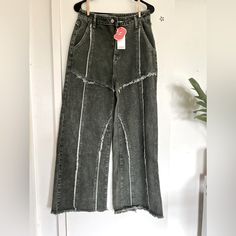 Cider Solid Raw Hem Stitch Jeans Medium/Us Size 6 Oversized *Nwt Mid-rise Medium Wash Bottoms With Frayed Hem, Mid-rise Acid Wash Bottoms With Pockets, Wide-leg Cotton Jeans With Frayed Hem, Acid Wash Denim Mid-rise Bottoms, Urban Wide-leg Jeans With Frayed Hem, Stitch Jeans, Hem Stitch, Flare Jeans, Cider