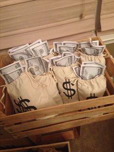 a wooden crate filled with lots of money