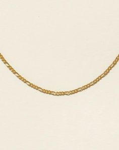 Gold-Filled Figaro Chain Midori Jewelry Co. Gold Charm Necklace With Figaro Chain In 14k Gold, Dainty 14k Gold Figaro Chain Necklace, Minimalist Tarnish Resistant Link Charm Necklace, Elegant Figaro Chain Link Charm Necklaces, Elegant Figaro Chain Link Charm Necklace, Minimalist 14k Gold-filled Figaro Chain Necklace, 14k Gold Filled Figaro Chain Necklace For Layering, Elegant Charm Necklaces With Figaro Chain, Dainty 14k Gold Charm Necklace With Figaro Chain