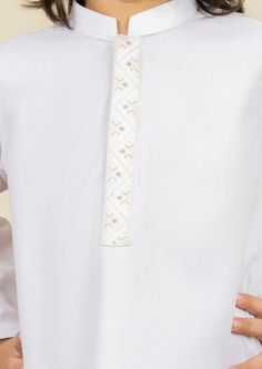 2 Piece Kurta Shalwar for Boys. Formal Suit For Infants, With Embroidery Work On Collar And Placket Description Kurta (Shirt) : With Embroidery Work On Collar And Placket. The color is White Shalwar (Trouser) : White White Churidar With Dabka For Eid, White Dabka Churidar For Eid, White Lawn Suit For Eid Ceremonies, White Dabka Churidar For Traditional Ceremonies, White Lawn Suit For Eid And Traditional Ceremonies, White Lawn Suit For Traditional Ceremonies And Eid, White Kurta With Dabka Work For Eid, Kurta With Motifs For Traditional Ceremonies At Eid, Eid White Kurta With Dabka Work