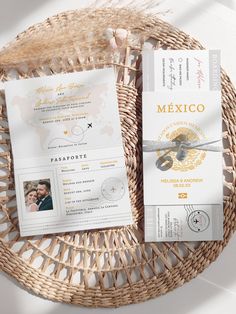 the wedding stationery is laid out in a wicker basket on top of each other