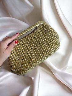 Timeless and high quality handmade crochet knitted product  ✅A stylish women's accessory for daily use, special occasions, invitations, evenings! Wedding Party season  has begun and this bag will be the perfect choice 🤩 you will shine like a star All eyes will be on you this season with our trendy Metallic clutch lined with luxuriously matching Satin, metallic vegan leather and rich jewel tone colours, and you can be sure that these jewels will stand out in the crowd. Whether it's a night out, Gold Crochet, Metallic Clutch, Jewel Tone Colors, Wedding Clutch, Purse Bag, Leather Pouch, Gold Fashion, Metallic Leather, Handmade Bags