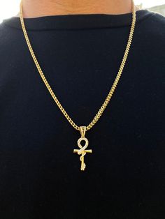 Type: 14K Yellow Gold Pendant Finish: Polished Pendant Width: 15 mm Pendant Length: 37 mm Average Weight: 3.12 gr . . #crosspendant #crosscharm #goldcross #crossnecklace #goldpendant #goldnecklace #pendant #fashion #giftfordad #mothersdaygift #weddinggift #birthdaygiftsforboyfriend Yellow Gold Plated Box Chain Jewelry, Gold-plated Yellow Gold Jewelry With Box Chain, 14k Gold Curb Chain Pendant Necklace, Yellow Gold Symbolic Jewelry With Box Chain, Yellow Gold Cuban Link Jewelry With 17 Jewels, Gold Pendant Chain Necklace, Symbolic Yellow Gold Jewelry With Box Chain, Hallmarked Yellow Gold Ankh Jewelry, Symbolic Gold-tone Gold-plated Jewelry