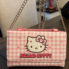 Cute Hello Kitty Come With A Shoulder/Crossbody Chain Pink Hello Kitty Shoulder Bag For Everyday, Cute Hello Kitty Rectangular Shoulder Bag, Cheap Hello Kitty Print Rectangular Shoulder Bag, Everyday Kawaii Hello Kitty Shoulder Bag, Cheap Pink Hello Kitty Print Shoulder Bag, Cute Pink Hello Kitty Shoulder Bag, Hello Kitty Lunch Bag, Hello Kitty Games, Hello Kitty Bags