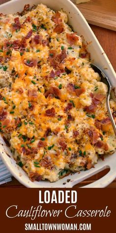 loaded cauliflower casserole with bacon and cheese in a white baking dish