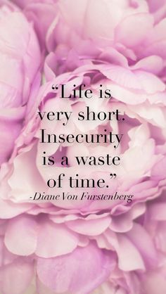 a pink flower with the quote life is very short insecivity is a waste of time