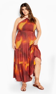 Drape your curves in summer elegance with our beautifully tailored Tahiti Tie Dye Maxi Dress. With a halter neck and adjustable straps for the perfect fit, this dress is made for hot days by the beach. Key Features Include: - Halter neckline - Thin adjustable straps - Elasticated shirred bodice - Pull over style - Tiered design - Unlined - Maxi length Keep it cool and casual in slides and a pair of cat-eye sunglasses. | Plus Size Tahiti Tie Maxi Dress in Tangerine Tie Dye, Size 20 | City Chic Tangerine Dress, Summer Elegance, Rose Maxi Dress, Tie Maxi Dress, Tango Dress, Keep It Cool, Tie Dye Maxi Dresses, Tie Dye Maxi, By The Beach