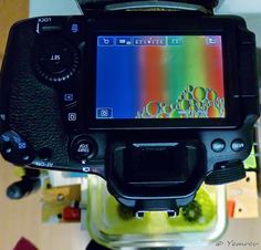 a camera with a multicolored image on the screen