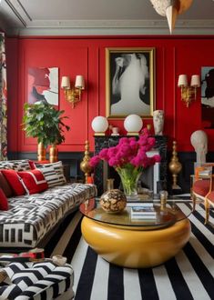 a living room with red walls, black and white striped rug, yellow coffee table