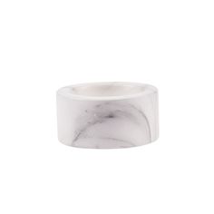 a white marble ring on a white background