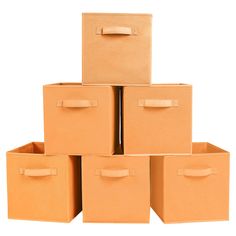 six brown boxes stacked on top of each other