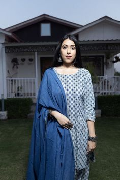 This print on print suit set comes with comfort bottoms of a Pakistani salwar and indigo mul mul dupatta. Finished with gota details. Blue Block Print Palazzo Set With Long Sleeves, Blue Mulmul Palazzo Set With Printed Motifs, Blue Bollywood Palazzo Set With Printed Motifs, Blue Cotton Silk Kurta With Printed Motifs, Blue Cambric Palazzo Set For Eid, Eid Blue Cambric Palazzo Set, Cotton Silk Lawn Suit With Block Print Straight Kurta, Cotton Silk Lawn Suit With Block Print, Blue Palazzo Set With Printed Motifs And Straight Kurta