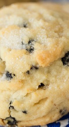 two blue and white cookies stacked on top of each other