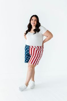 Features High rise Frayed hem Zipper fly Flag print: blue with white stars; red and white stripes 93% Cotton, 6% Polyester, 1% Spandex Size + Fit Kristin is 5'4", a size 1 and is wearing a Small Ashley is 5'6", a size 18 and is wearing a 1X Small 2-4, Medium 6-8, Large 10-12, X-Large 14-16, 1X 16-18, 2X 18-20, 3X 20-22 True to size. Do have stretch, but do not lose shape. Waist measurements are taken while laying flat and doubled. Curvy sizes have more room in the waist Click here for white top Patriotic Cotton Bottoms For 4th Of July, Casual White Bottoms For 4th Of July, American Flag Cotton Bottoms For Memorial Day, Patriotic American Flag Print Cotton Bottoms, Patriotic White Bottoms For Summer, American Flag Print Shorts For Memorial Day, American Flag Print Cotton Bottoms For Memorial Day, White Patriotic Bottoms For Summer, Patriotic Bottoms With Flag Print For 4th Of July