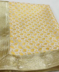 Sri Guru Granth Sahib Ji Rumala Sahib Double Set with Palkan /Rumala Brochet Fabric/RELIGIOUS RUMALA SAHIB full set of palkan Read The Description before ordering. Complete Double Set Golden and yellow blend base with yellow color Paisley pattern with Golden Gota on the border. Brochet Fabric. Sri Guru Granth Sahib Ji Rumala Sahib. Rumala Sahib is a cloth used to cover Dhan-Dhan Sri Guru Granth Sahib Ji. Beautifully Hand Crafted Double-set Rumala Sahib Set. 2 Pcs Rumala Sahib and 2 Pcs Palka.Thi Gold Jamawar Sherwani For Diwali, Brocade Dupatta Sets For Diwali, Festive Gold Sherwani With Dupatta, Gold Sherwani With Dupatta For Festive Occasions, Brocade Set With Dupatta For Diwali, Gold Jamawar Kurta For Navratri, Traditional Gold Jamawar Kurta, Traditional Gold Anarkali Set For Eid, Traditional Gold Semi-stitched Sherwani