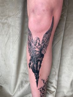 Angel tattoo on my shin/ knee Angel Shin Tattoo, Angel Tattoo Men Leg, Knee Fold Tattoo, Men’s Knee Tats, Angel Tattoo On Thigh, Angel Leg Tattoo Men, Knee Wings Tattoo, Angel Knee Tattoo, Angel Tattoo Leg