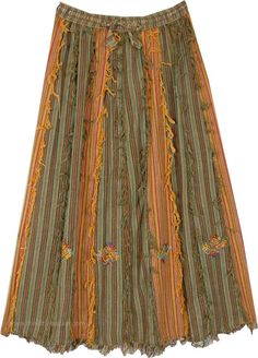 A one of a kind boho chic skirt in cotton, this long skirt is perfect for a summer fiesta! With its olive undertones, this multicolor fringe skirt has a striped look with patchwork on the lower hem. The cotton thread frills along the stitch give it a bohemian highlight - the frills are only on the front and at the hem. #tlb #Patchwork #Embroidered #Misses #Fringe #longskirt #cottonskirt #summerskirt Bohemian Cotton Bottoms With Fringe, Bohemian Cotton Fringe Bottoms, Bohemian Skirt With Tassels, Summer Cotton Skirt With Tassels, Bohemian Maxi Skirt With Tassels, Bohemian Long Skirt With Tassels, Bohemian Tiered Skirt With Tassels, Skirt With Frills, Boho Chic Skirts