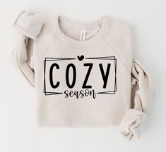 Cozy Season Sweatshirt - Weekend Sweatshirt - Comfy Sweatshirt - Bella Canvas Sweatshirt - Winter Sweatshirt - Snow Sweatshirt - Wasn't made for Winter Sweatshirt This item is handmade! SIZING: Sweatshirts are Bella + Canvas Unisex and super soft! They run true to size. Please check the sizing guide before ordering. COLORS: Colors may vary slightly from computer/device. WASH & CARE: For your sweatshirt to stay in tip-top shape the longest, it is best to wash shirt inside out and hang dry. Do not Cozy Fit Comfortable Cotton Tops, Comfortable Cozy Fit Cotton Top, Comfortable Cotton Tops With Cozy Fit, Winter Cotton Crew T-shirt, Comfy Cotton Tops With Cozy Fit, White Relaxed Fit Comfy Tops, White Comfy Cotton Sweater, Comfy White Cotton Sweater, White Cotton Comfy Sweater