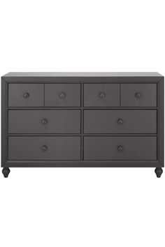 a gray dresser with six drawers