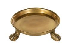 a brass plate with two hands on the bottom and one foot in the middle, is shown