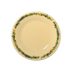 a white plate with green, red and yellow decorations on the rim is shown in front of a white background