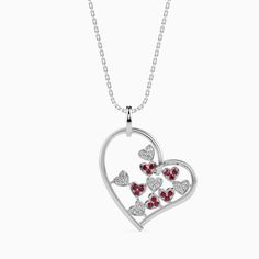 Platinum Pendants Platinum ruby & diamonds heart pendant for women. Metal : Platinum Platinum Purity : 95% Purity Mark : Pt 950 Width : 4.48 mm Gemstone : Natural Diamonds & Ruby Diamond Clarity : VVS or SI (as selected above) Diamond Color : GH or IJ (as selected above) Ruby Weight : 0.20 cts Diamond Weight : Pendant : 0.15 cts. Estimated Platinum Weight : Pendant : 3.03 grams Diamond Grading Report : SGL Certificate of Authenticity : Platinum Guild International Please note : The chain is only Valentine's Day Diamond Heart Necklace With Birthstone, Valentine's Day Diamond Heart Birthstone Necklace, Valentine's Day Diamond Heart Necklace With Gemstone, Valentine's Day Diamond Gemstone Heart Necklace, Ruby Heart Pendant, Platinum Chain, Ruby Heart, Platinum Rose Gold, Beautiful Notes