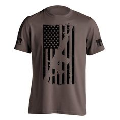 Lock and Load Your Style with Our American Flag Gun Tee! Gear up for a fashion revolution with our American Flag Gun T-shirt! Crafted from the softest ring spun cotton known to patriots and trendsetters alike, this tee isn't just clothing; it's a bold statement of your American pride and individuality. Featuring an eye-catching American flag gun design, this tee packs a patriotic punch like no other. With every wear, you'll command attention and show the world your unwavering allegiance to the l Made In Usa Tri-blend Graphic Tee, Usa Made Tri-blend Graphic Tee, Tri-blend Graphic Tee Made In Usa, American Flag Cotton T-shirt For Streetwear, Veterans Day Crew Neck T-shirt Made In Usa, Patriotic Punch, Patriotic Tees, Home Of The Brave, Handy Dandy