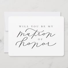 a white card with the words will you be my matron or honor?