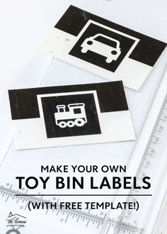 the printable toy bin labels are on top of a ruler and paper with scissors